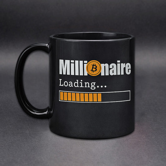 Schwarze Bitcoin Tasse mit Schriftzug „Millionaire Loading“