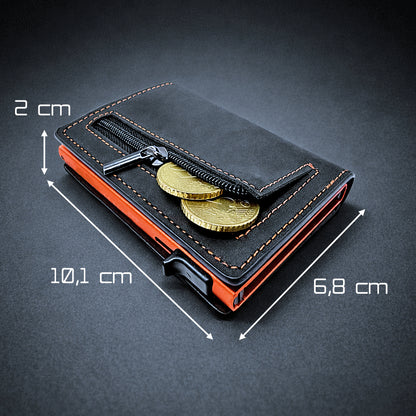 Premium Bitcoin Geldbörse aus schwarzem Leder mit orangefarbenem Alu-Case, RFID-Schutz und Münzfach hinten