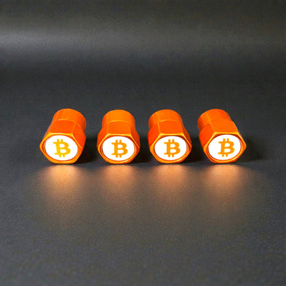 Orange Ventilkappen liegend nebeneinander