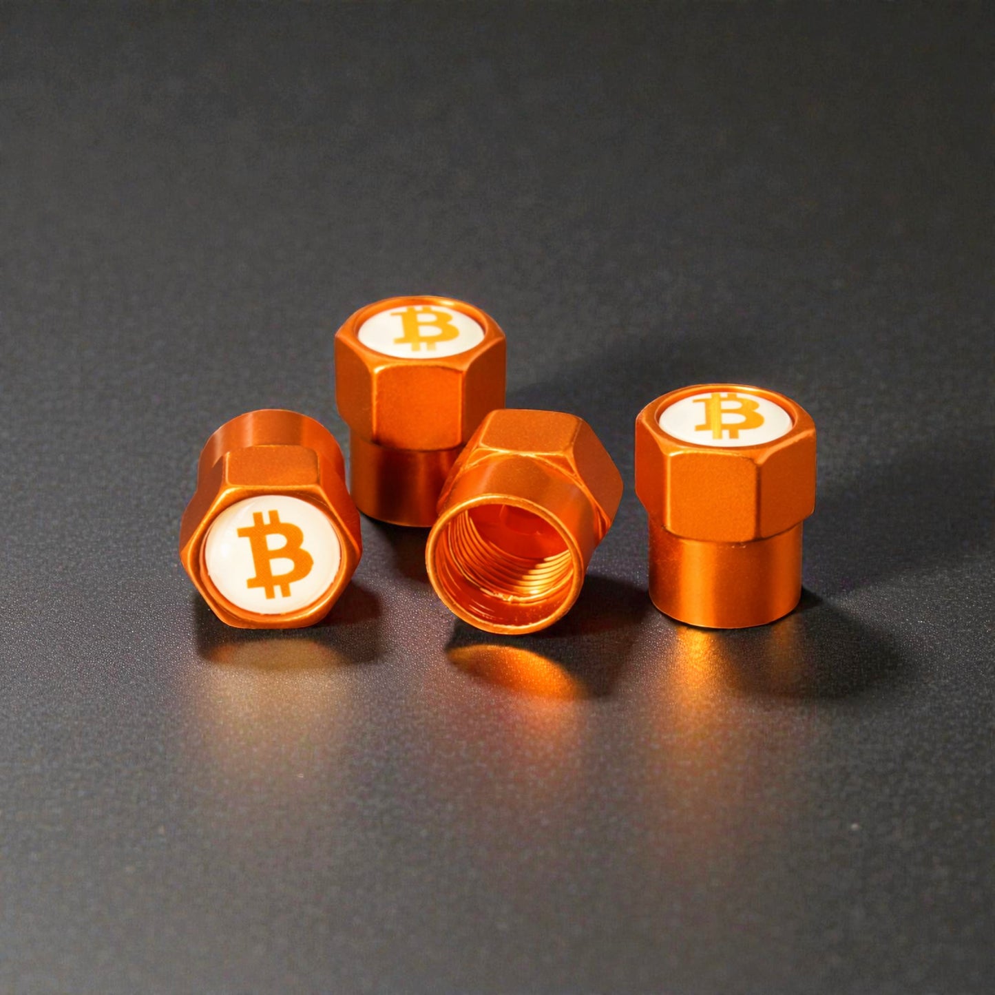 Ventilkappen in Orange mit sichtbarer Öffnung auf der Rückseite